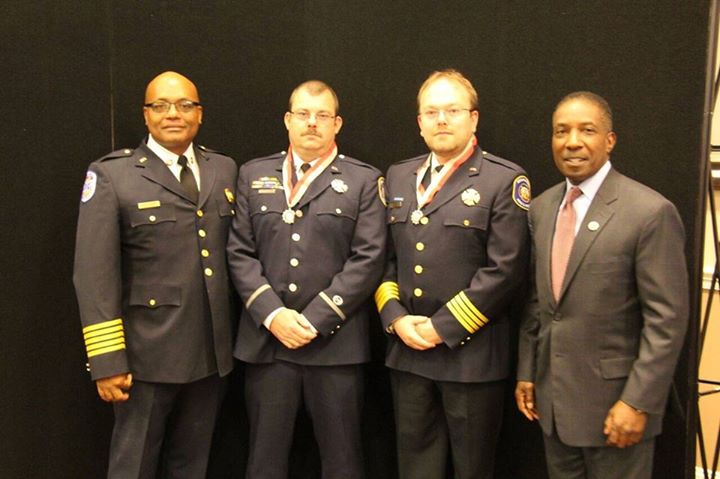 Pictured left to right are Fire Chief/Paramedic John Butler, Lt./Paramedic Will Huber (also received the award), Medical Director Matt Levy, Howard County Chief Administrative Officer Lonnie Robbins