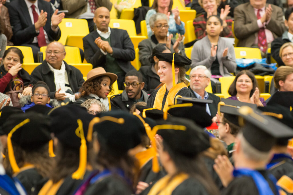 Erika Nesvold is honored by Pres. Hrabowski during Graduate Commencement.