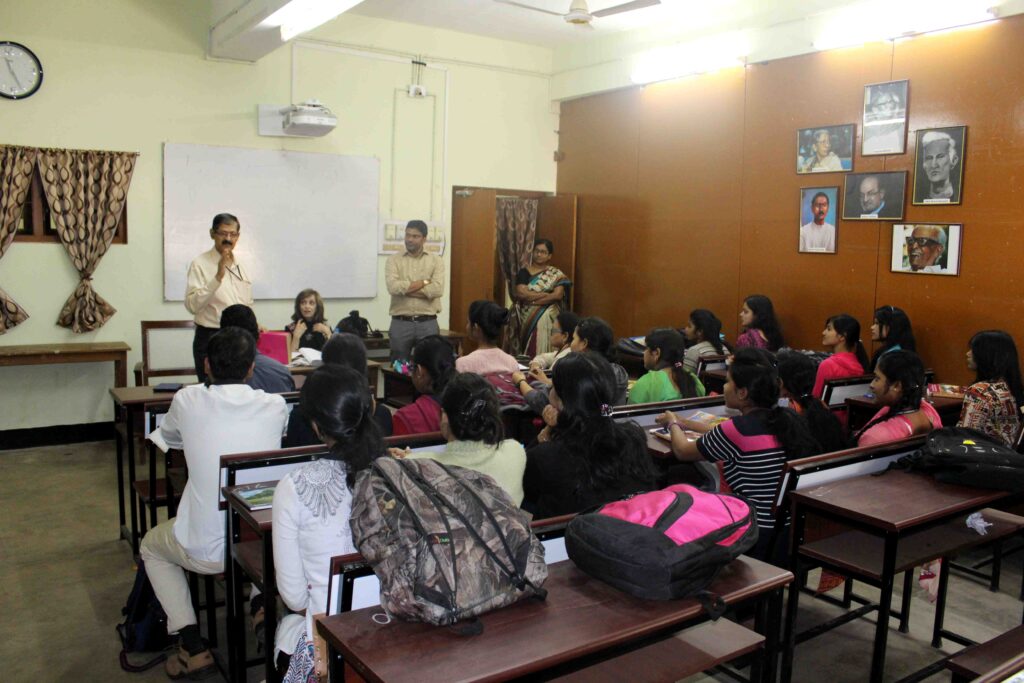 Ellen Handler Spitz is introduced to the class at Utkal University by the department chair, Professor Himansu Mohapatra.