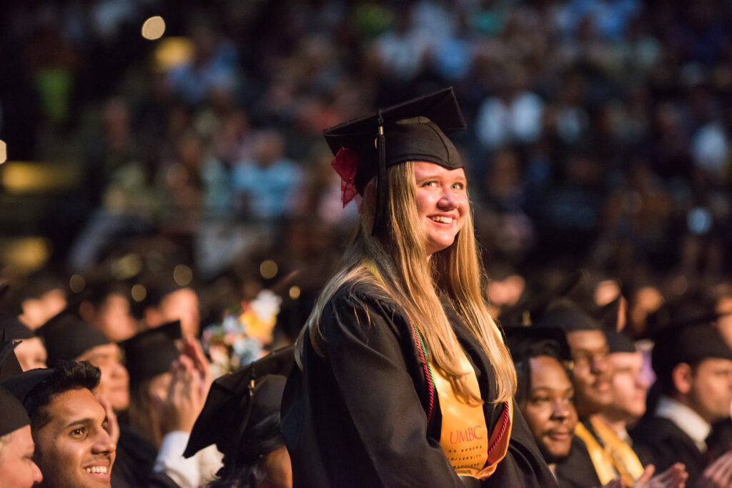 Heather Frank stands during the undergraduate commencement ceremony.